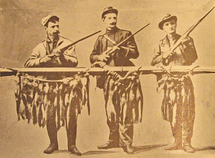 Three “over limit” squirrel hunters (L to R: T.W. Kramer, R.H. Kramer, George Loneberger) targeted for public chastisement by Shields, October, 1909.